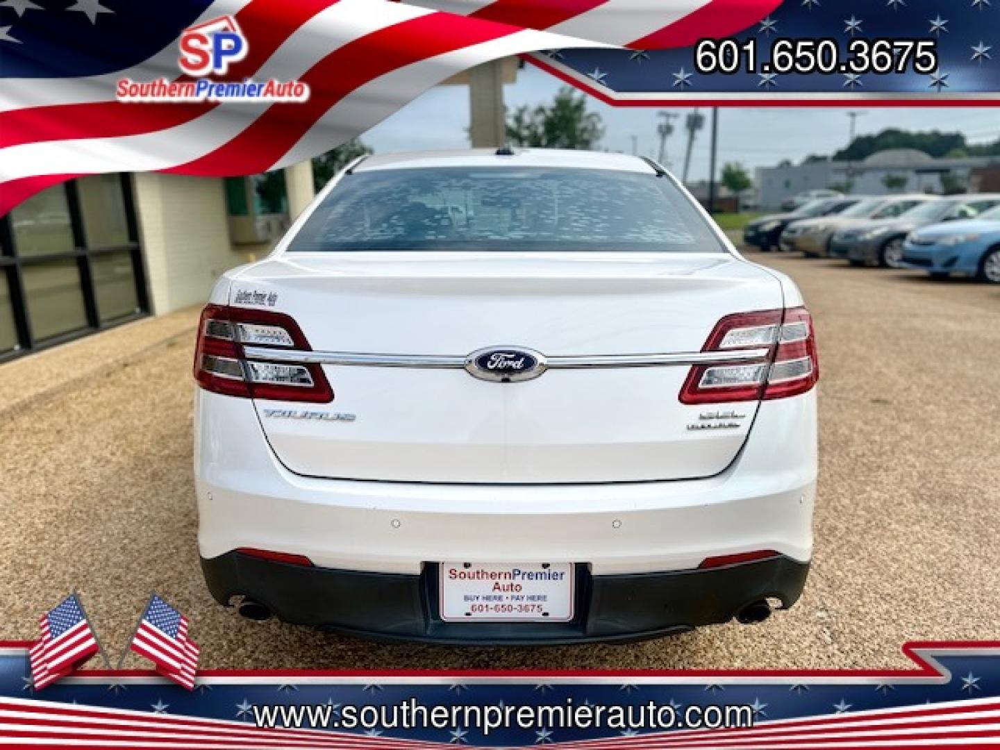 2015 WHITE FORD TAURUS SEL (1FAHP2E86FG) , located at 922 W. Beacon St., Philadelphia, MS, 39350, (601) 650-3675, 32.770447, -89.127151 - Photo#4